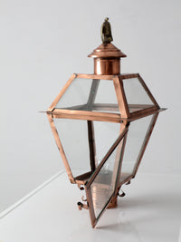 vintage copper lantern light fixture with brass eagle finial