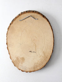 vintage deer wall art on wood slab
