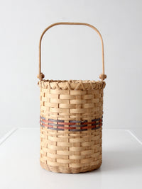 vintage woven splint basket with swing handle