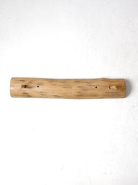 vintage hand-carved pine wall rack with peg hooks