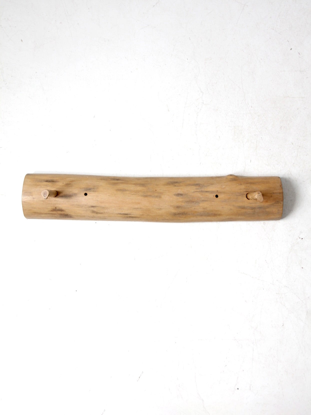 vintage hand-carved pine wall rack with peg hooks