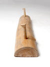 vintage hand-carved pine wall rack with peg hooks