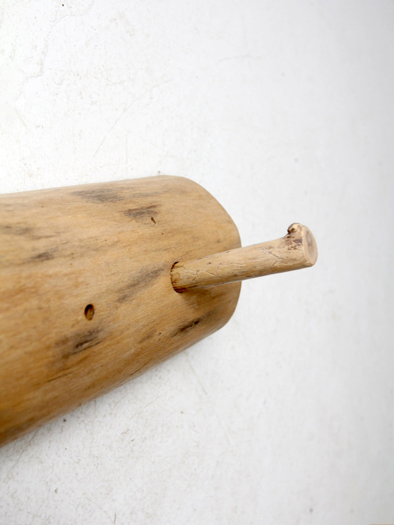 vintage hand-carved pine wall rack with peg hooks