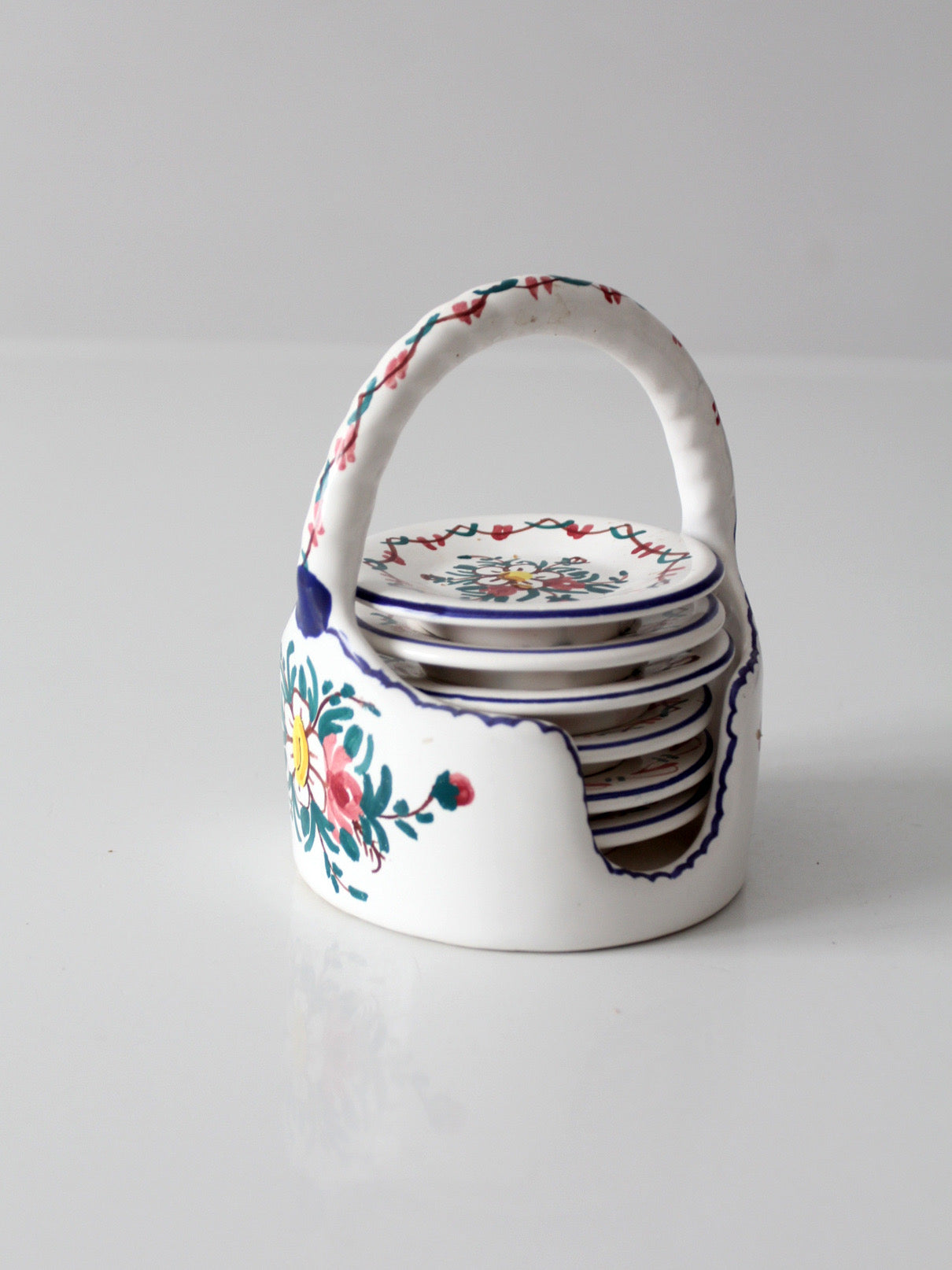 vintage Crespo Spanish pottery coaster set with basket holder