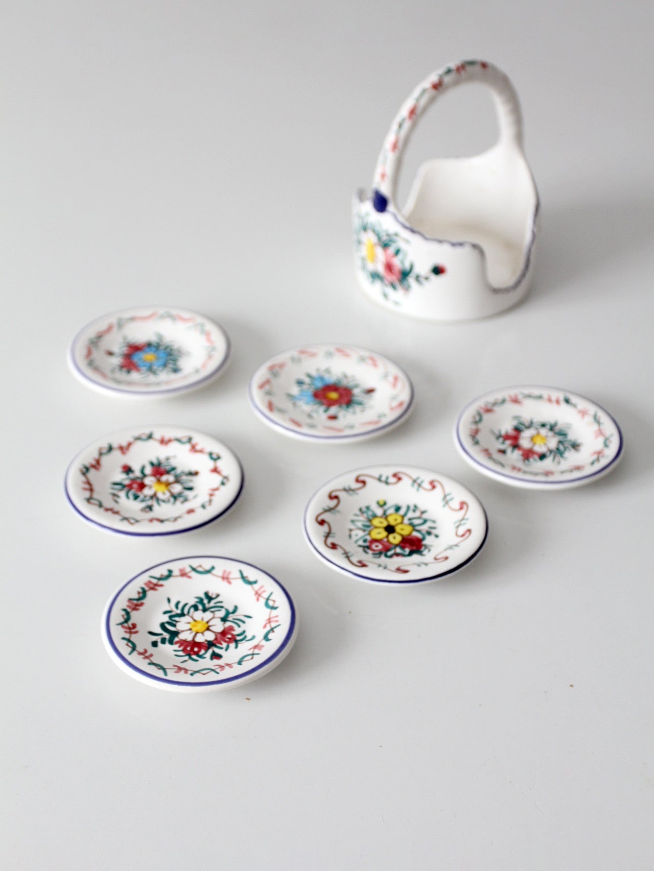 vintage Crespo Spanish pottery coaster set with basket holder