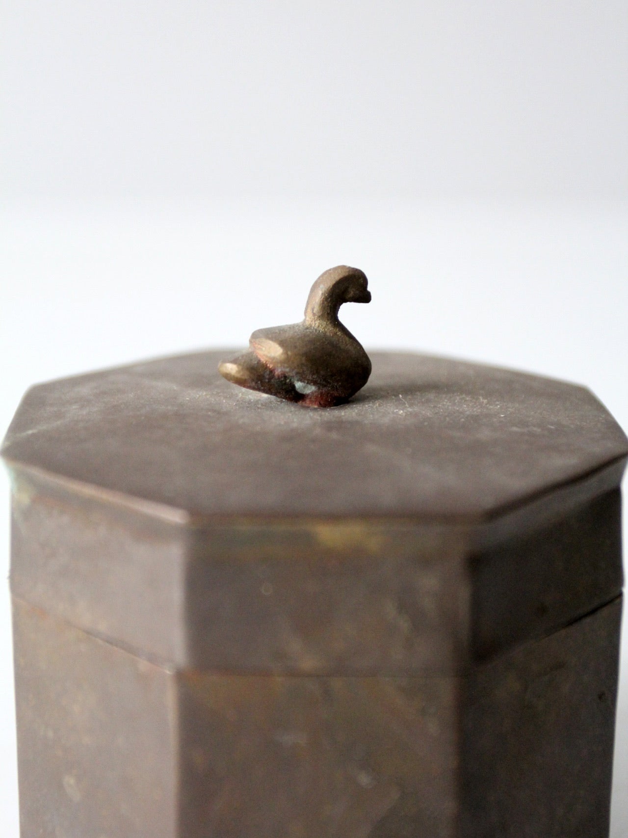 mid-century brass box with bird finial