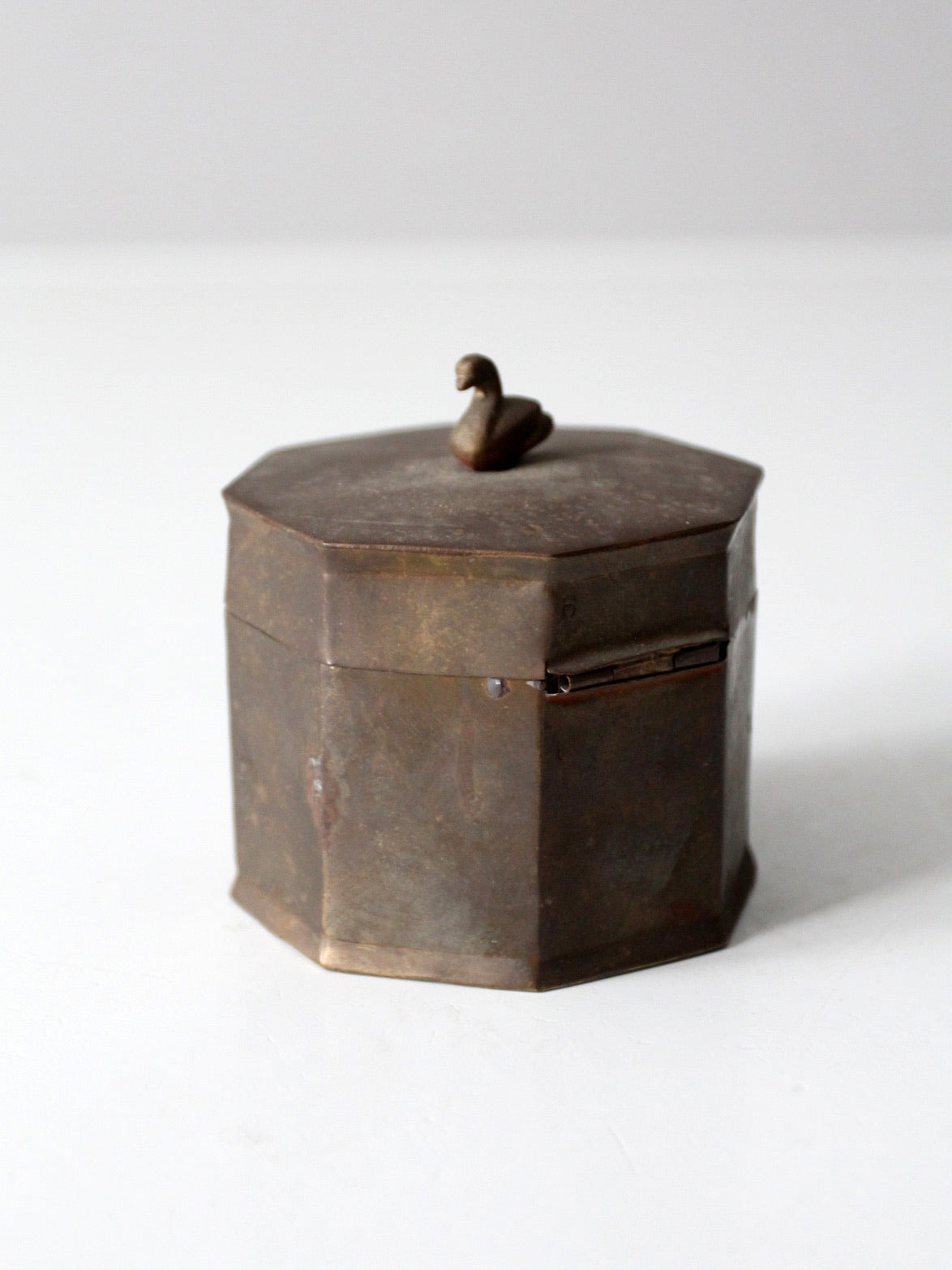 mid-century brass box with bird finial