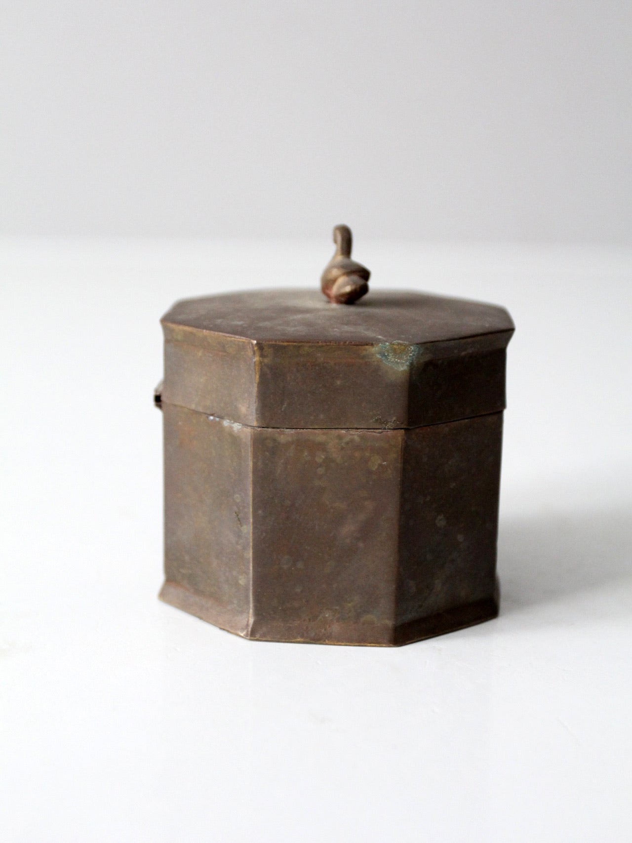 mid-century brass box with bird finial