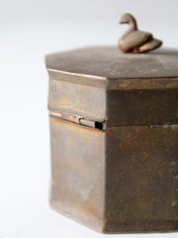 mid-century brass box with bird finial