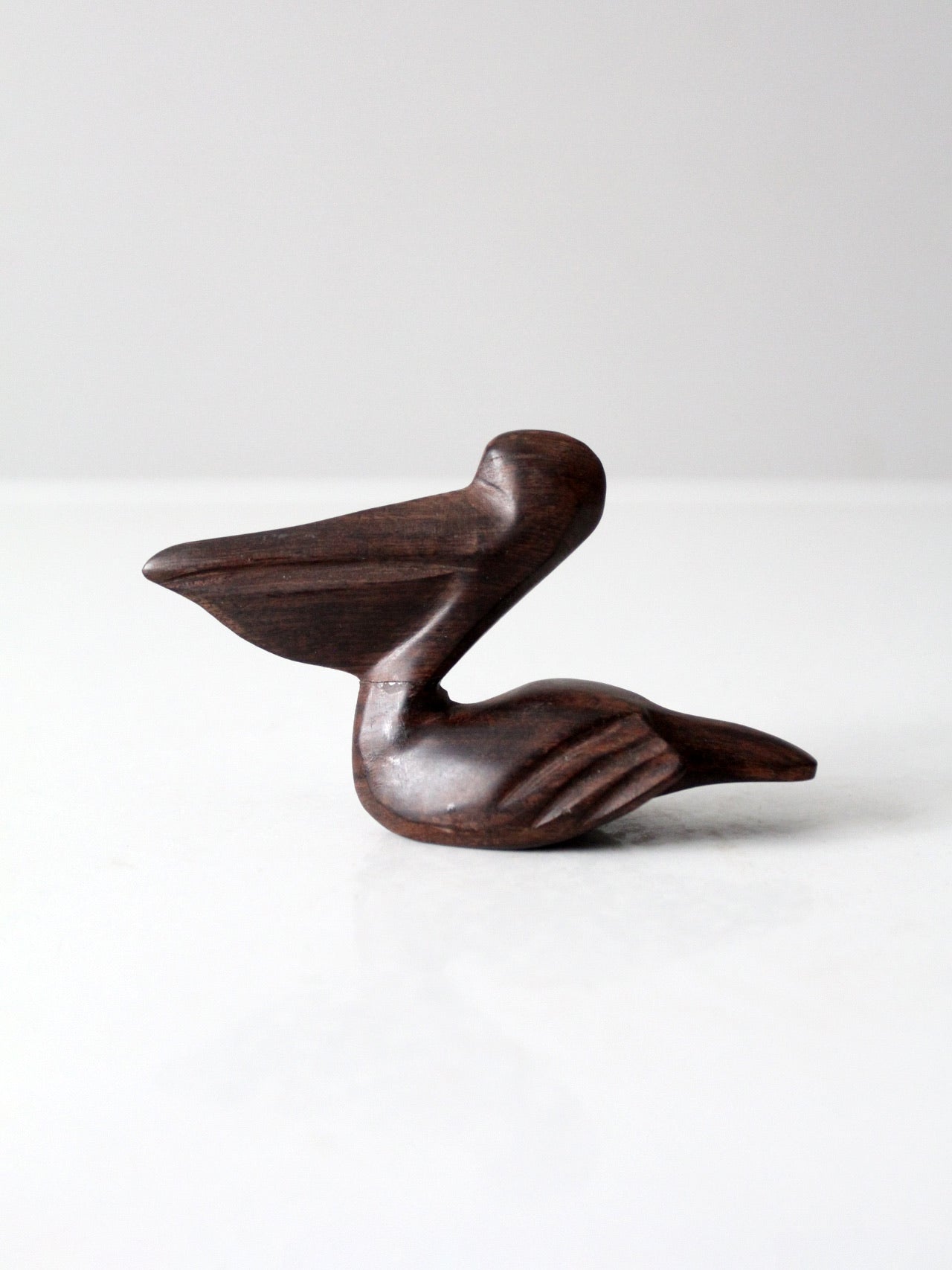 mid-century ironwood pelican