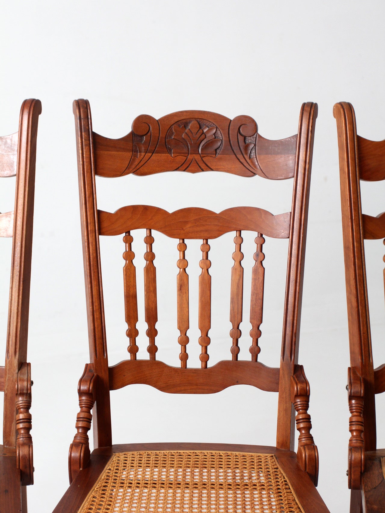 antique Eastlake Revival cane seat dining chairs | set of 3
