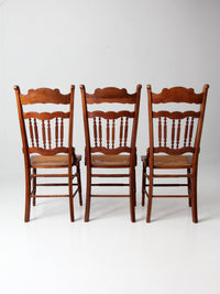 antique Eastlake Revival cane seat dining chairs | set of 3