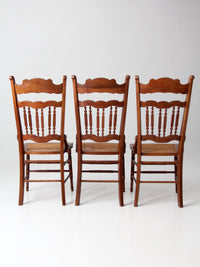 antique Eastlake Revival cane seat dining chairs | set of 3