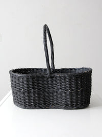 vintage black woven gathering basket