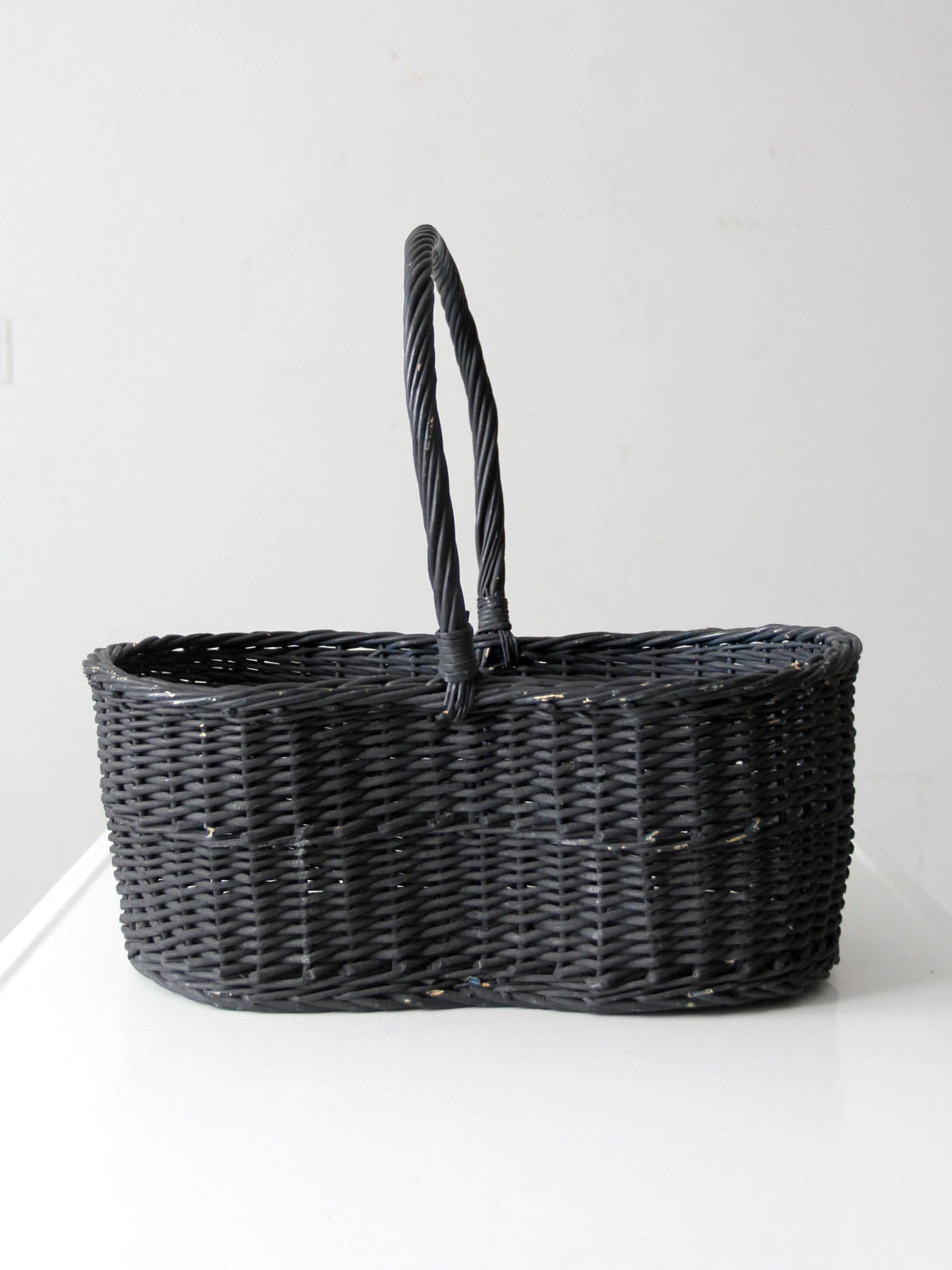 vintage black woven gathering basket