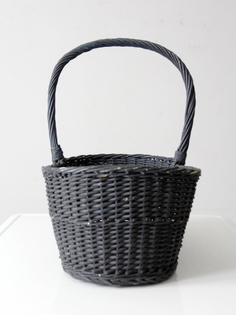 vintage black woven gathering basket