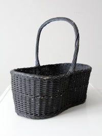 vintage black woven gathering basket