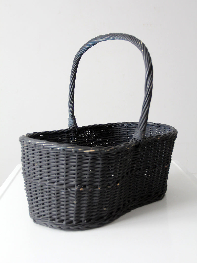 vintage black woven gathering basket