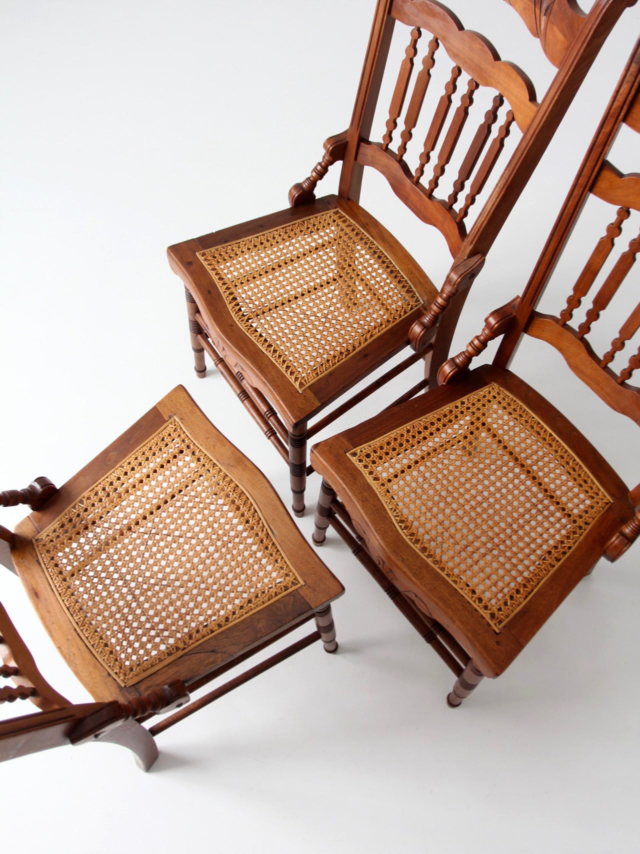 antique Eastlake Revival cane seat dining chairs | set of 3