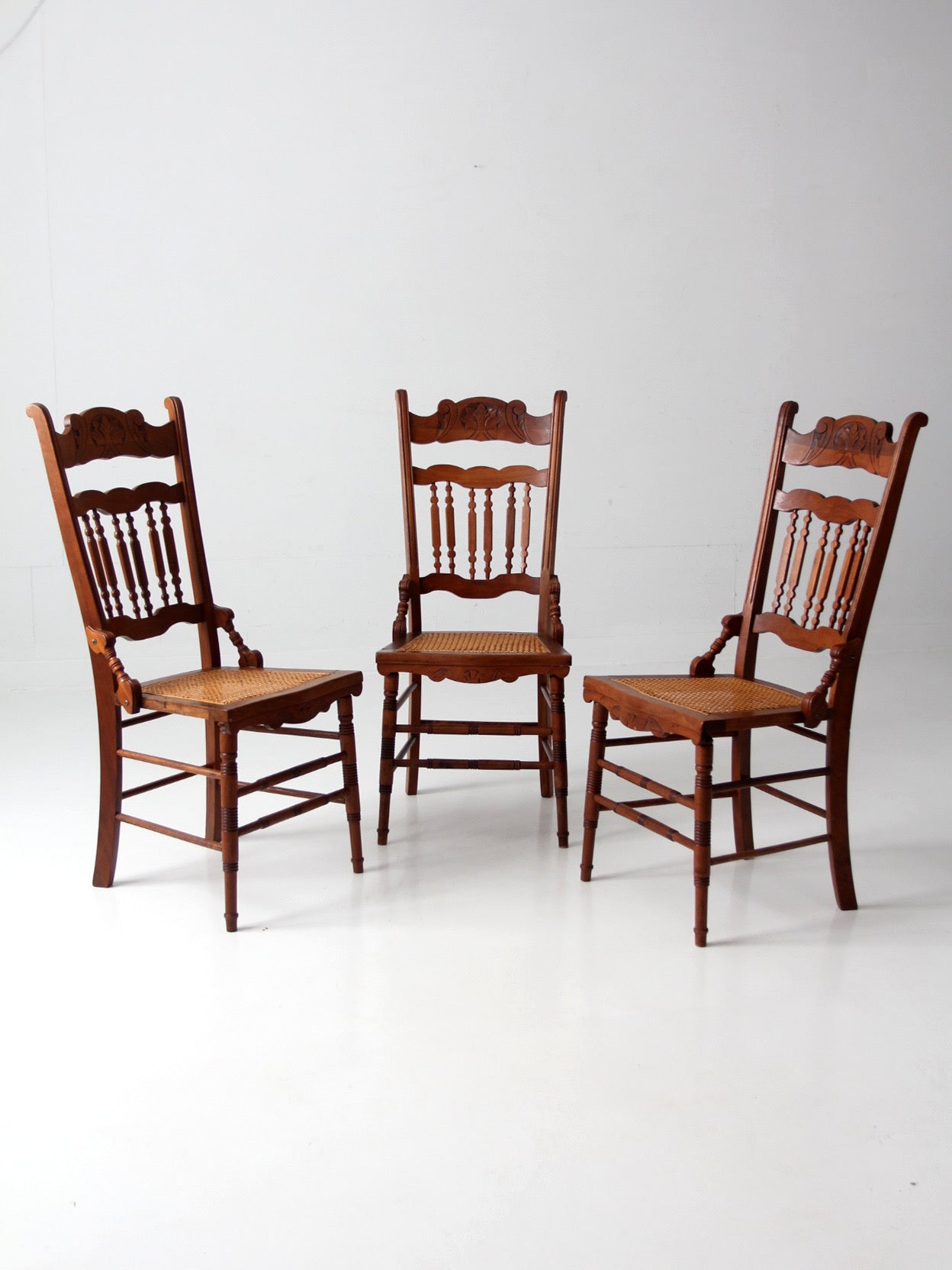 antique Eastlake Revival cane seat dining chairs | set of 3