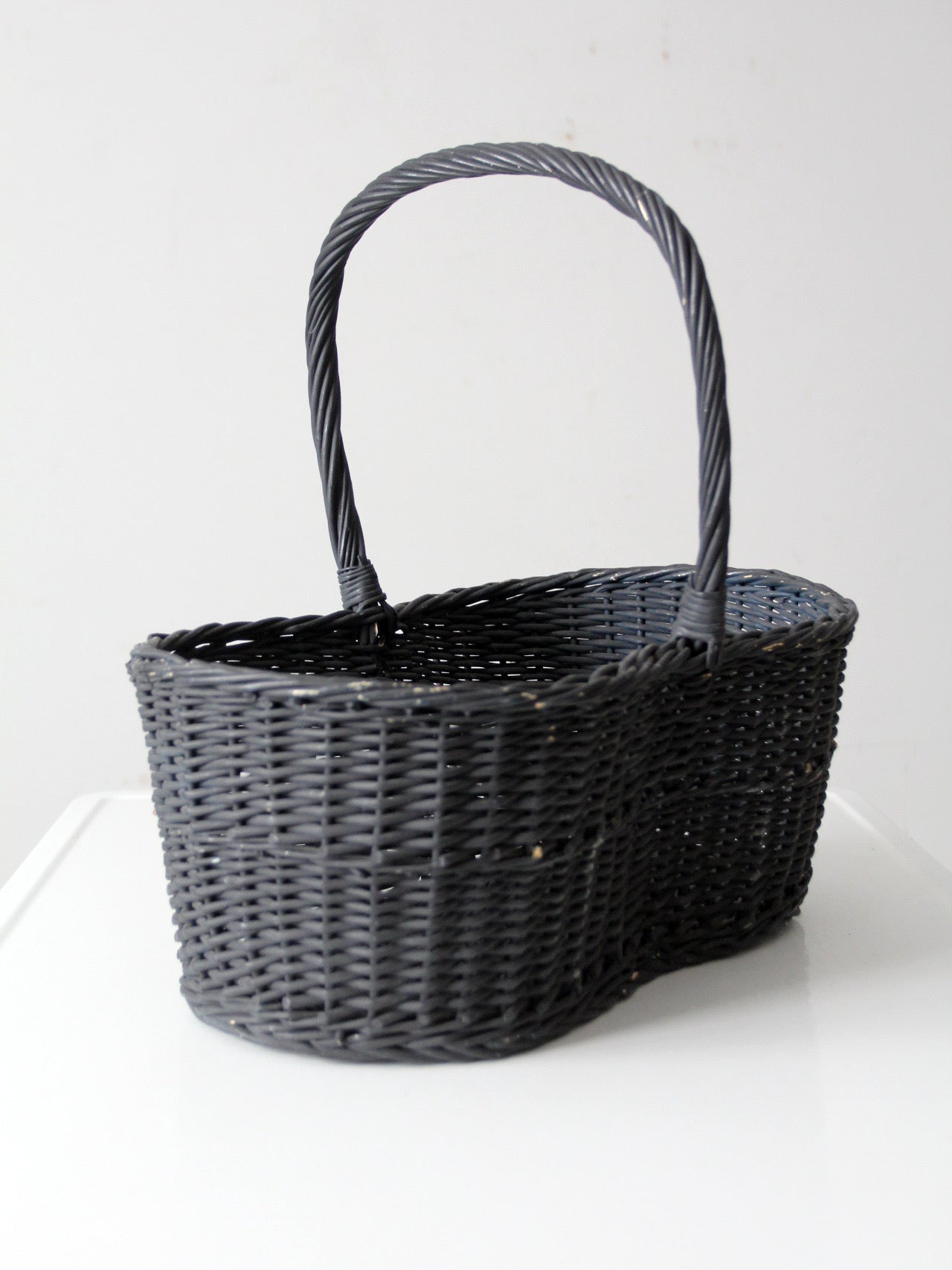 vintage black woven gathering basket