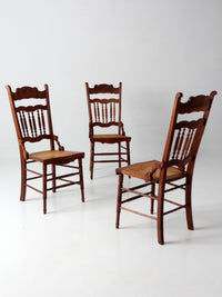 antique Eastlake Revival cane seat dining chairs | set of 3