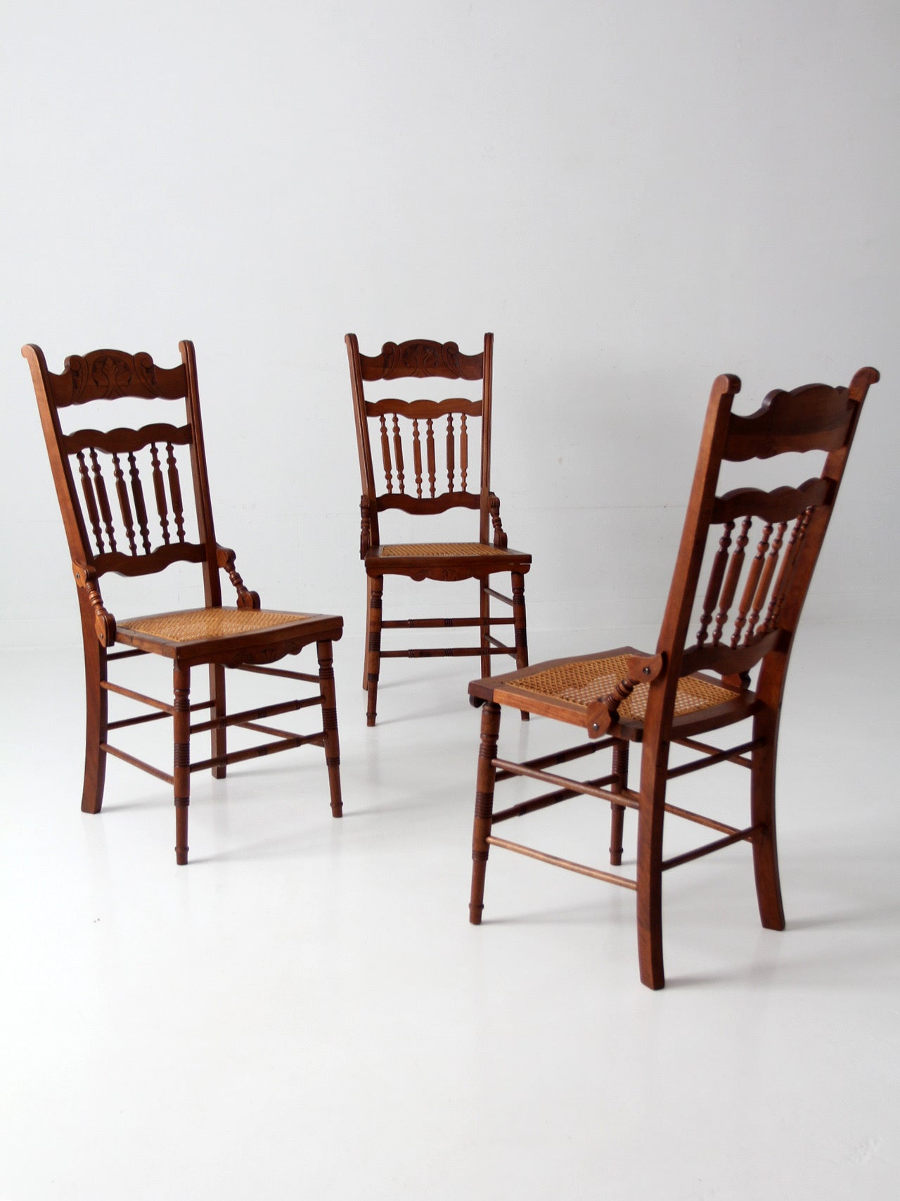 antique Eastlake Revival cane seat dining chairs | set of 3