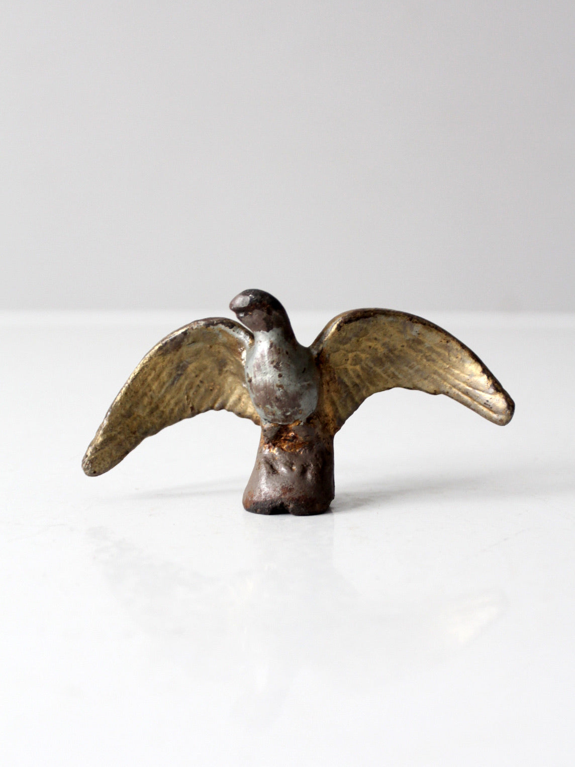 antique eagle figurine