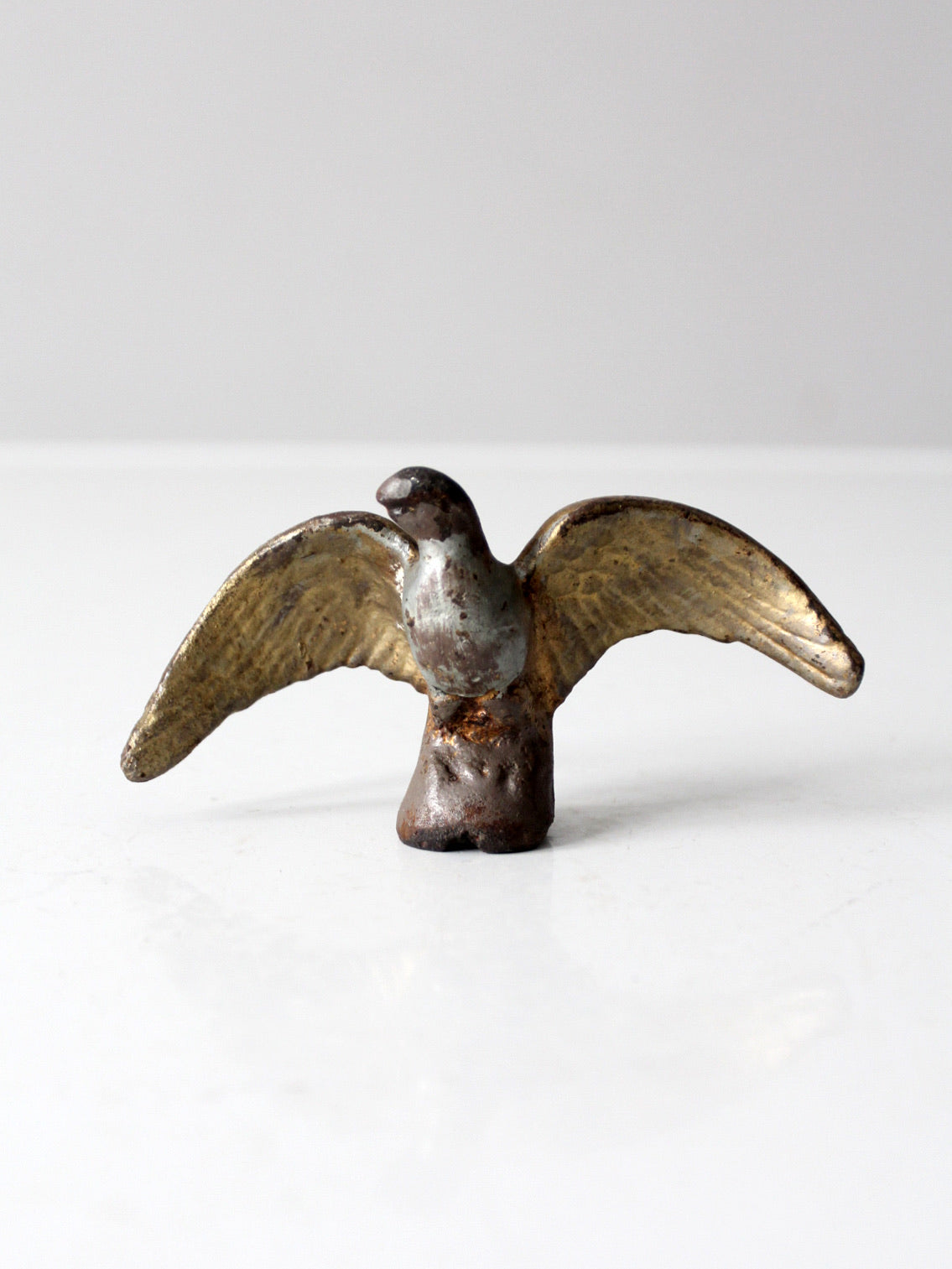 antique eagle figurine