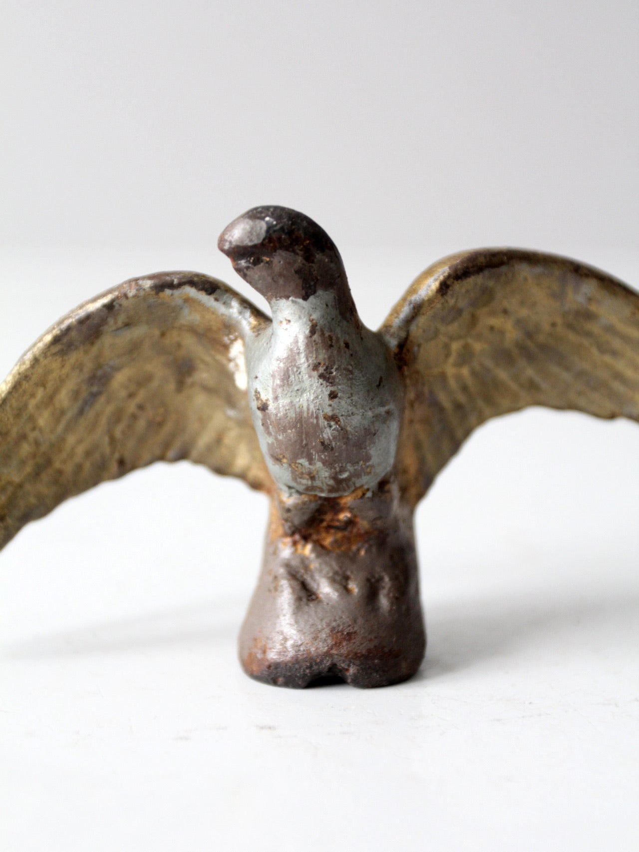 antique eagle figurine