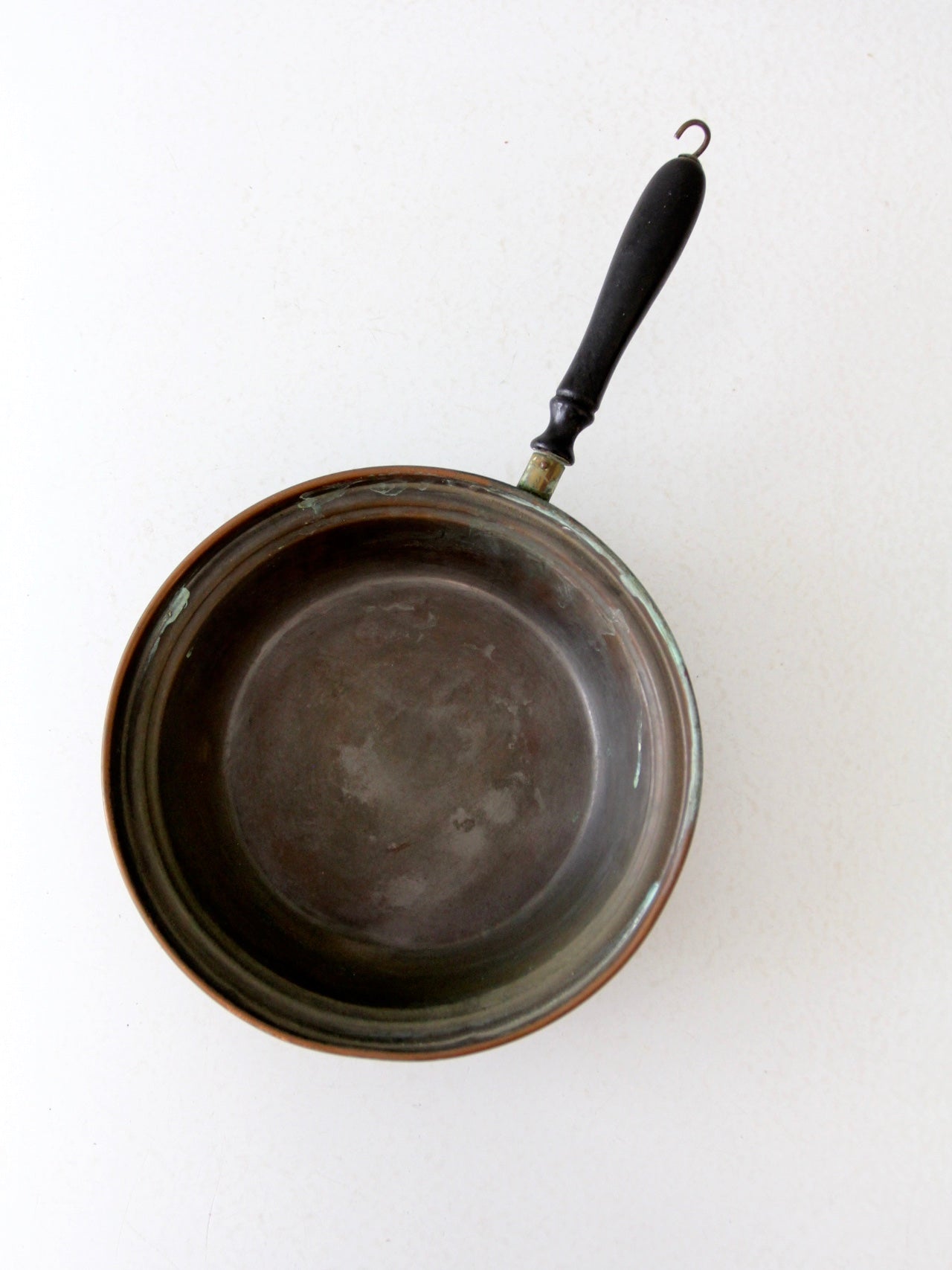 antique copper saute pan with wood handle