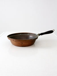 antique copper saute pan with wood handle