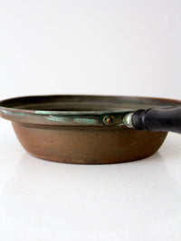 antique copper saute pan with wood handle