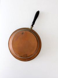 antique copper saute pan with wood handle