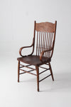 antique pressed back arm chair