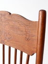 antique pressed back arm chair