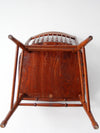 antique pressed back arm chair