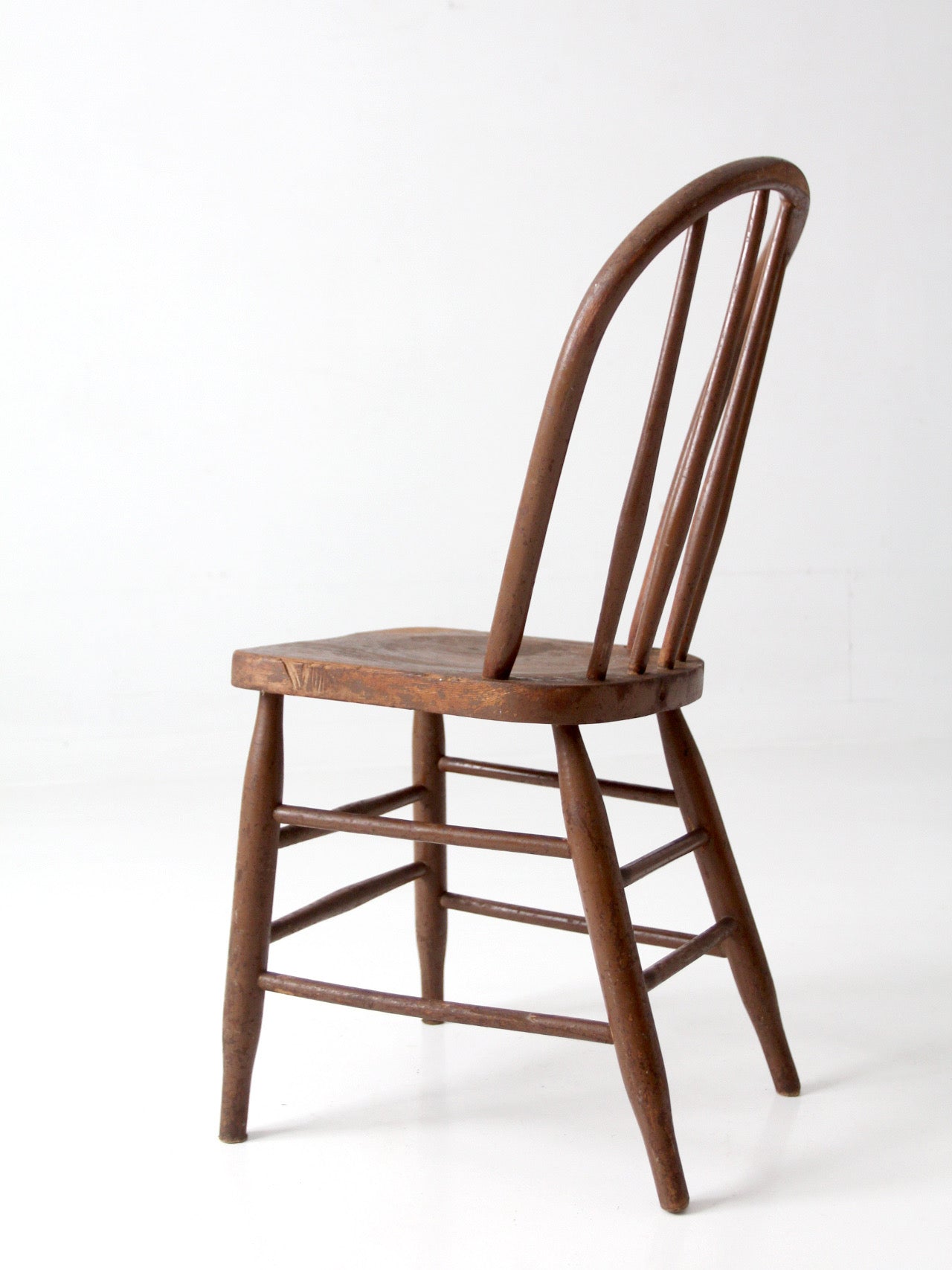 antique Windsor bow back spindle chair