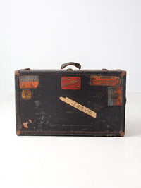 antique leather suitcase with European hotel labels, early 20th century