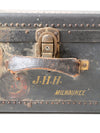 antique leather suitcase with European hotel labels, early 20th century