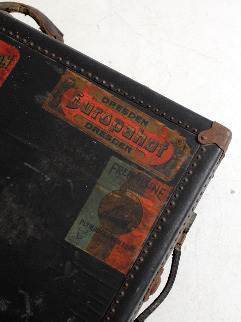 antique leather suitcase with European hotel labels, early 20th century