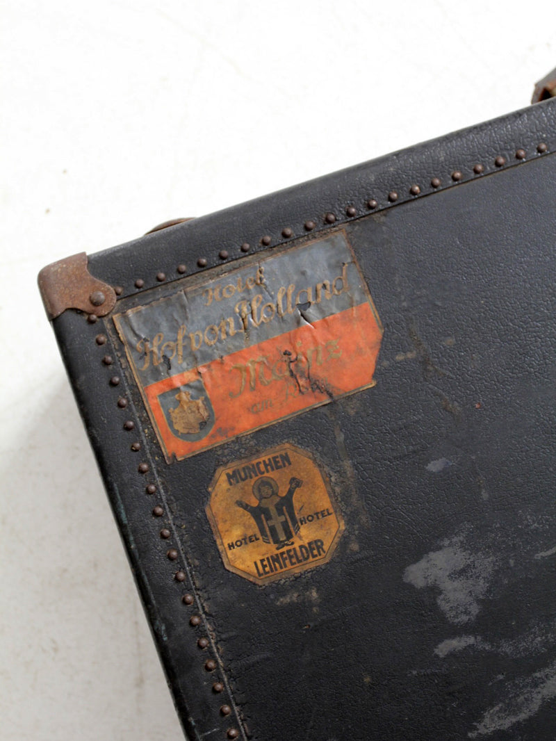 antique leather suitcase with European hotel labels, early 20th century