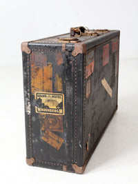 antique leather suitcase with European hotel labels, early 20th century