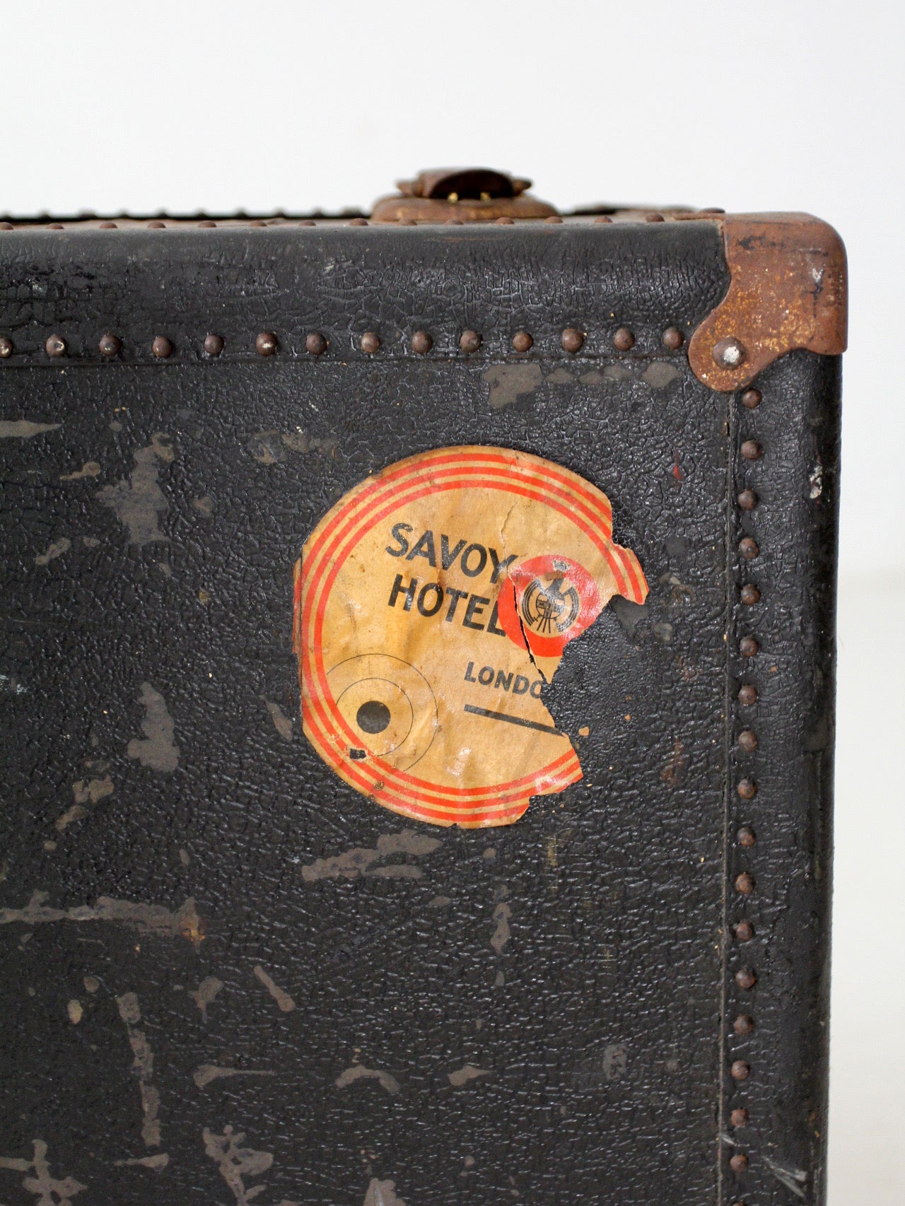 antique leather suitcase with European hotel labels, early 20th century
