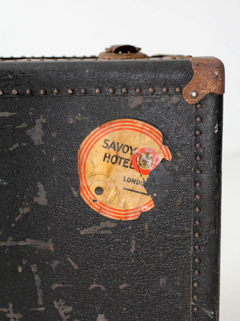antique leather suitcase with European hotel labels, early 20th century
