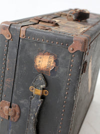 antique leather suitcase with European hotel labels, early 20th century