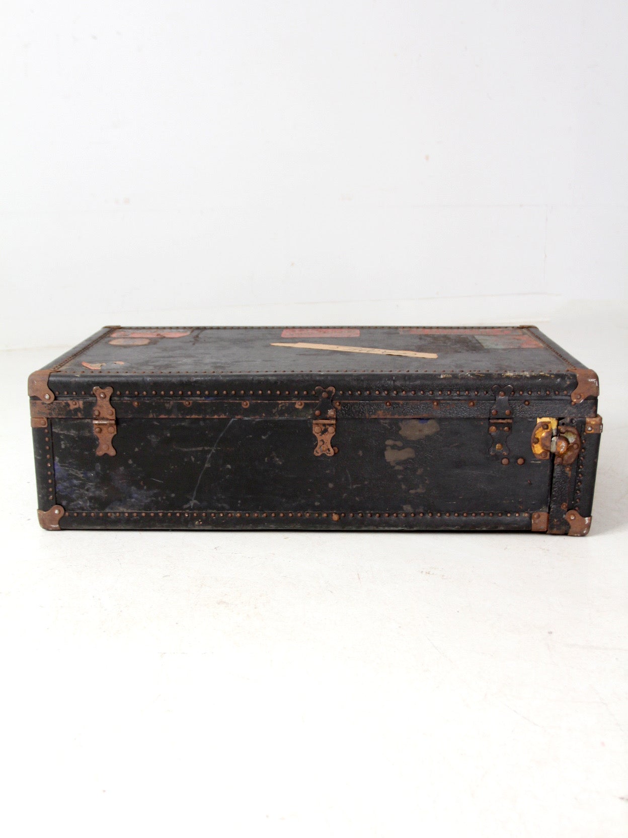 antique leather suitcase with European hotel labels, early 20th century