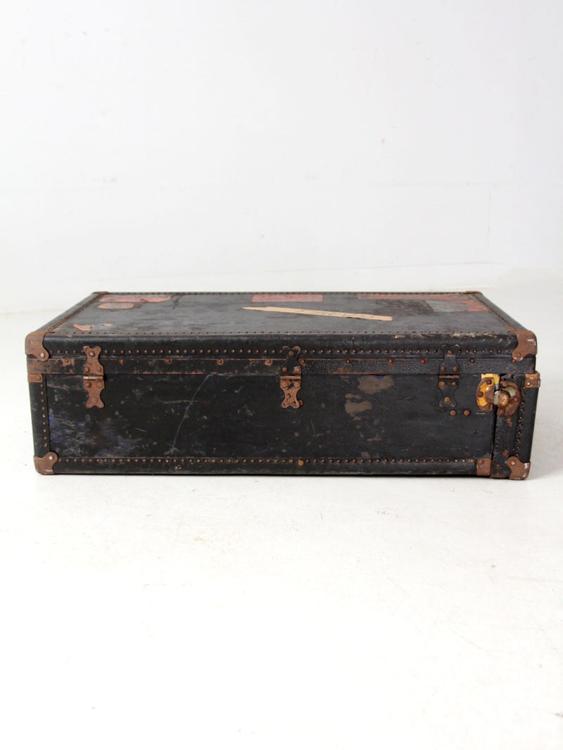 antique leather suitcase with European hotel labels, early 20th century