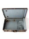 antique leather suitcase with European hotel labels, early 20th century