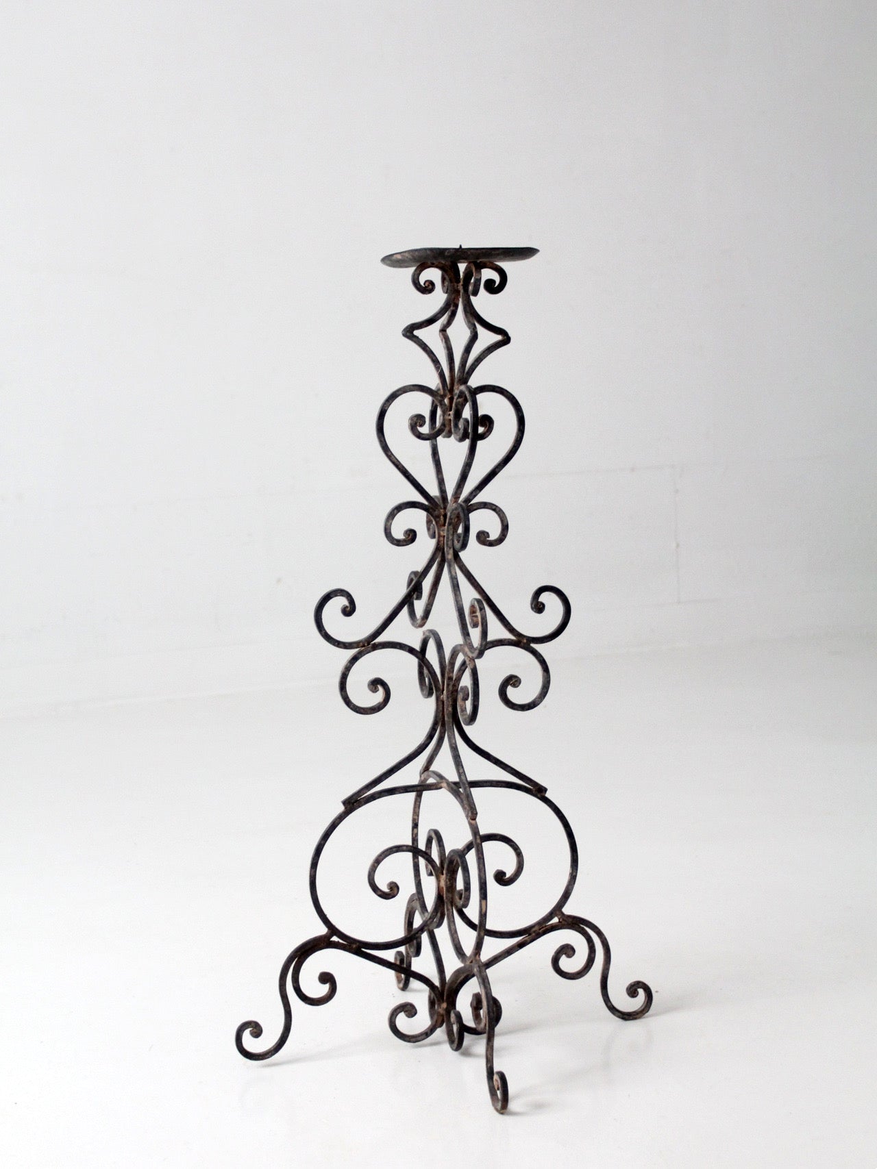 vintage scrollwork iron candle stand